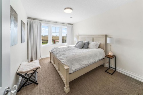 103 Brome Bend, Rural Rocky View County, AB - Indoor Photo Showing Bedroom