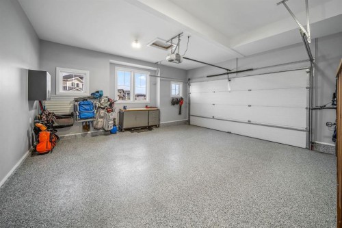 103 Brome Bend, Rural Rocky View County, AB - Indoor Photo Showing Garage