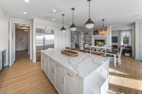 103 Brome Bend, Rural Rocky View County, AB - Indoor Photo Showing Kitchen With Upgraded Kitchen