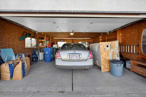332 Whitney Crescent Se, Calgary, AB - Indoor Photo Showing Garage