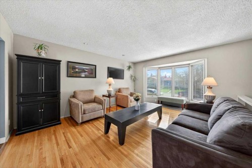 332 Whitney Crescent Se, Calgary, AB - Indoor Photo Showing Living Room