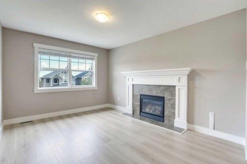 57 Sherwood Terrace Nw, Calgary, AB - Indoor Photo Showing Living Room With Fireplace