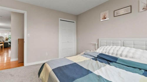 2416 Woodview Drive Sw, Calgary, AB - Indoor Photo Showing Bedroom