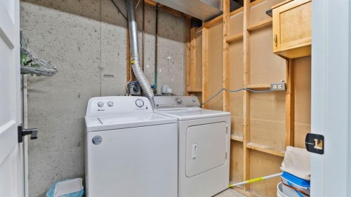 2416 Woodview Drive Sw, Calgary, AB - Indoor Photo Showing Laundry Room
