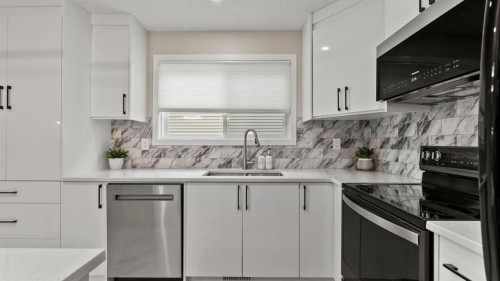 2416 Woodview Drive Sw, Calgary, AB - Indoor Photo Showing Kitchen With Double Sink With Upgraded Kitchen