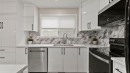 2416 Woodview Drive Sw, Calgary, AB  - Indoor Photo Showing Kitchen With Double Sink With Upgraded Kitchen 