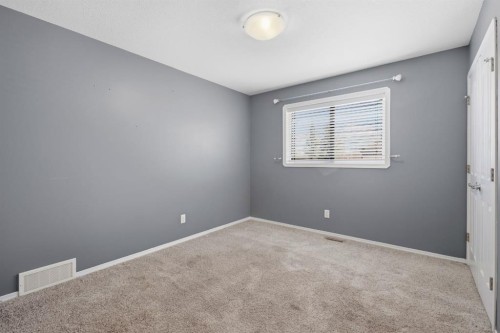 64 Isbister Close, Red Deer, AB - Indoor Photo Showing Other Room
