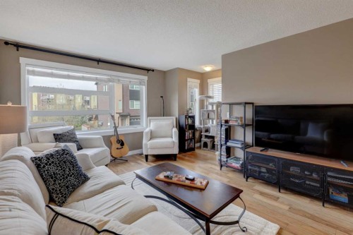 208 Covecreek Circle Ne, Calgary, AB - Indoor Photo Showing Living Room