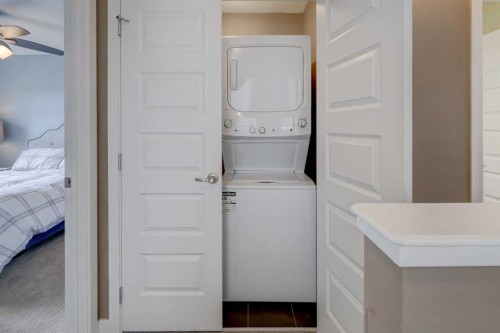 208 Covecreek Circle Ne, Calgary, AB - Indoor Photo Showing Laundry Room