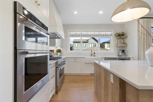44 Alpine Common Sw, Calgary, AB - Indoor Photo Showing Kitchen With Upgraded Kitchen