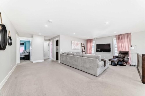 114 Kinniburgh Road, Chestermere, AB - Indoor Photo Showing Other Room With Fireplace