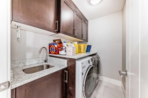 114 Kinniburgh Road, Chestermere, AB - Indoor Photo Showing Laundry Room