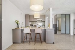 1406-221 6 Avenue SECalgary, AB T2G 4Z9