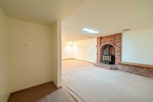 3320 Temple Road Ne, Calgary, AB - Indoor With Fireplace