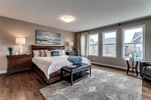 19 Aspen Acres Road Sw, Calgary, AB - Indoor Photo Showing Bedroom