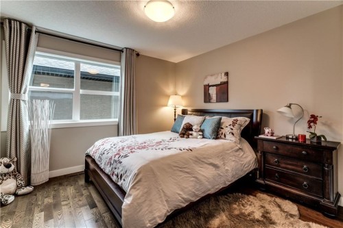 19 Aspen Acres Road Sw, Calgary, AB - Indoor Photo Showing Bedroom