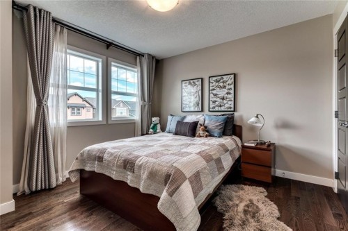 19 Aspen Acres Road Sw, Calgary, AB - Indoor Photo Showing Bedroom