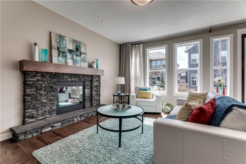 19 Aspen Acres Road Sw, Calgary, AB - Indoor Photo Showing Living Room With Fireplace