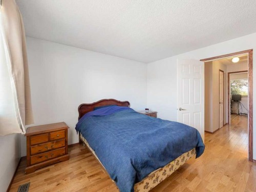 143 Erin Mount Place Se, Calgary, AB - Indoor Photo Showing Bedroom