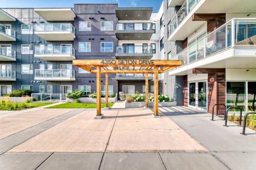217-4350 Seton Drive Se, Calgary, AB - Outdoor With Balcony With Facade