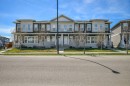 1265 Carrington Boulevard Nw, Calgary, AB  - Outdoor With Facade 