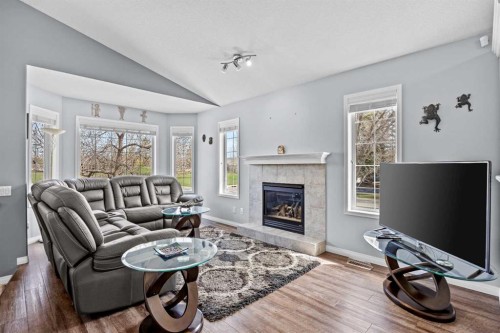 187 West Lakeview Circle, Chestermere, AB - Indoor Photo Showing Living Room With Fireplace