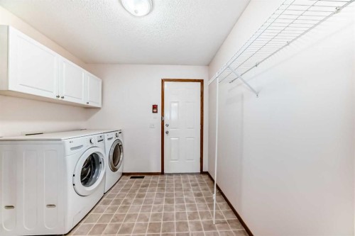 135 Panorama Hills Manor Nw, Calgary, AB - Indoor Photo Showing Laundry Room