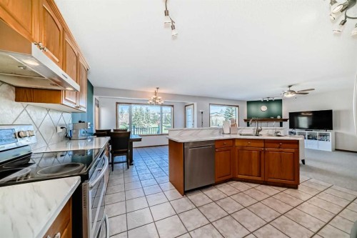 135 Panorama Hills Manor Nw, Calgary, AB - Indoor Photo Showing Kitchen With Double Sink
