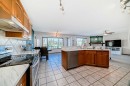 135 Panorama Hills Manor Nw, Calgary, AB  - Indoor Photo Showing Kitchen With Double Sink 