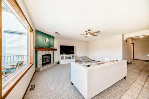 135 Panorama Hills Manor Nw, Calgary, AB - Indoor With Fireplace