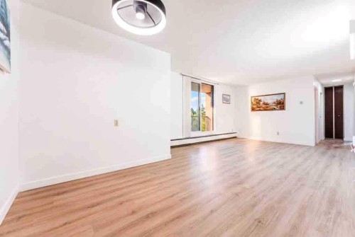 802-4944 Dalton Drive Nw, Calgary, AB - Indoor Photo Showing Other Room