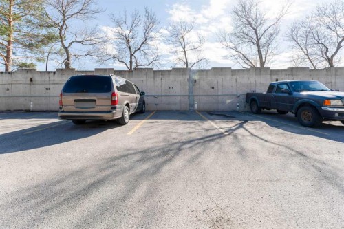 802-4944 Dalton Drive Nw, Calgary, AB - Indoor Photo Showing Other Room With In Ground Pool