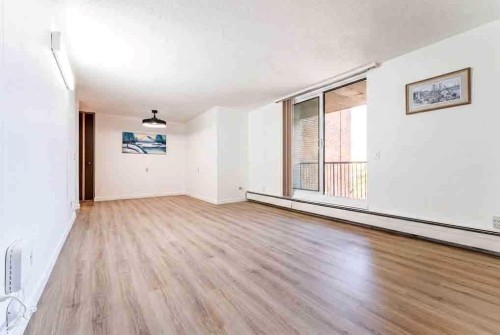 802-4944 Dalton Drive Nw, Calgary, AB - Indoor Photo Showing Other Room