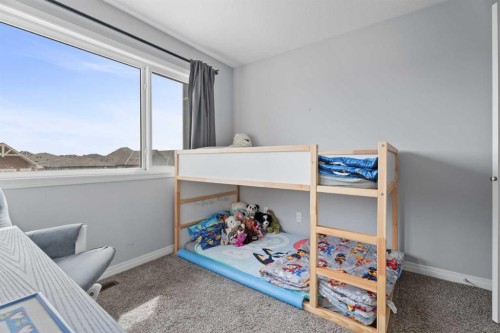 52 Saddlestone Drive Ne, Calgary, AB - Indoor Photo Showing Bedroom