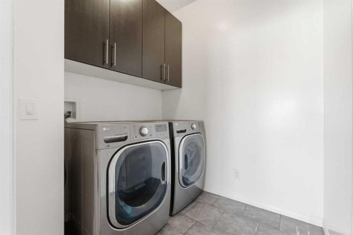 164 West Creek Green, Chestermere, AB - Indoor Photo Showing Laundry Room