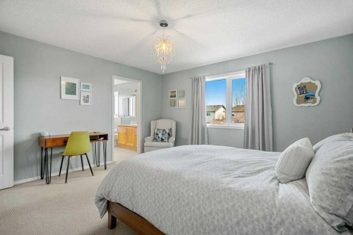 90 Elgin Drive Se, Calgary, AB - Indoor Photo Showing Bedroom