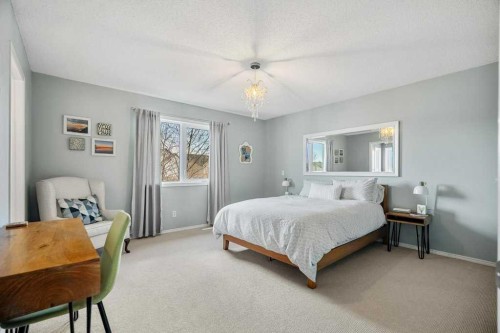 90 Elgin Drive Se, Calgary, AB - Indoor Photo Showing Bedroom