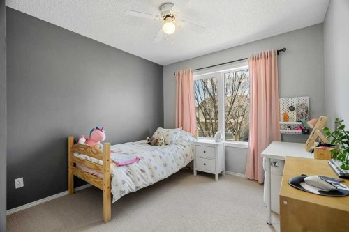 90 Elgin Drive Se, Calgary, AB - Indoor Photo Showing Bedroom