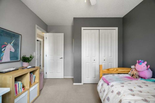 90 Elgin Drive Se, Calgary, AB - Indoor Photo Showing Bedroom
