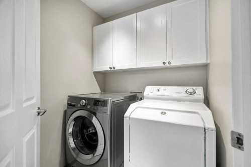90 Elgin Drive Se, Calgary, AB - Indoor Photo Showing Laundry Room