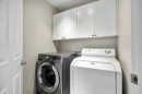 90 Elgin Drive Se, Calgary, AB  - Indoor Photo Showing Laundry Room 
