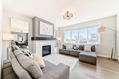 312 Auburn Shores Way Se, Calgary, AB - Indoor Photo Showing Living Room With Fireplace