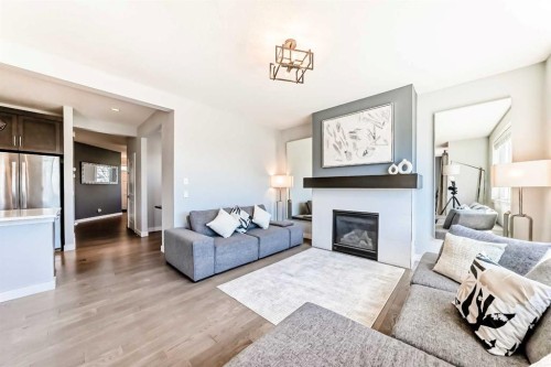 312 Auburn Shores Way Se, Calgary, AB - Indoor Photo Showing Living Room With Fireplace