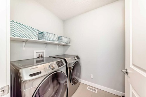 312 Auburn Shores Way Se, Calgary, AB - Indoor Photo Showing Laundry Room