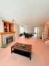 7212 Sierra Morena Boulevard Sw, Calgary, AB  - Indoor Photo Showing Living Room With Fireplace 