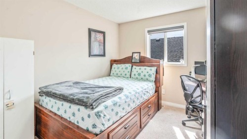 14 Silverado Ridge Link Sw, Calgary, AB - Indoor Photo Showing Bedroom