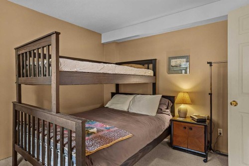 1054 Evergreen Circle, Canmore, AB - Indoor Photo Showing Bedroom