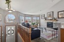 28 Westpoint Drive, Didsbury, AB  - Indoor Photo Showing Living Room With Fireplace 