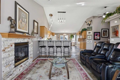 28 Westpoint Drive, Didsbury, AB - Indoor Photo Showing Living Room With Fireplace
