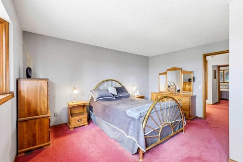 149 Edgehill Drive Nw, Calgary, AB - Indoor Photo Showing Bedroom
